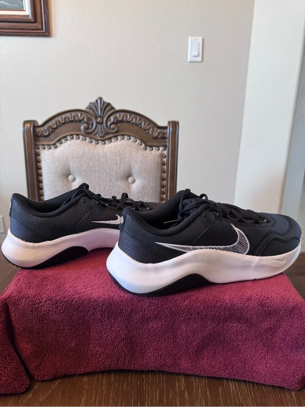 11 Men’s Nike Black Running Sneakers with White Swoosh